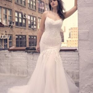 Bride in a white lace wedding dress.