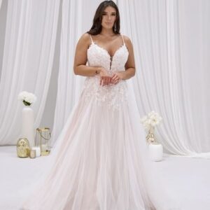 Woman in a white lace wedding dress.